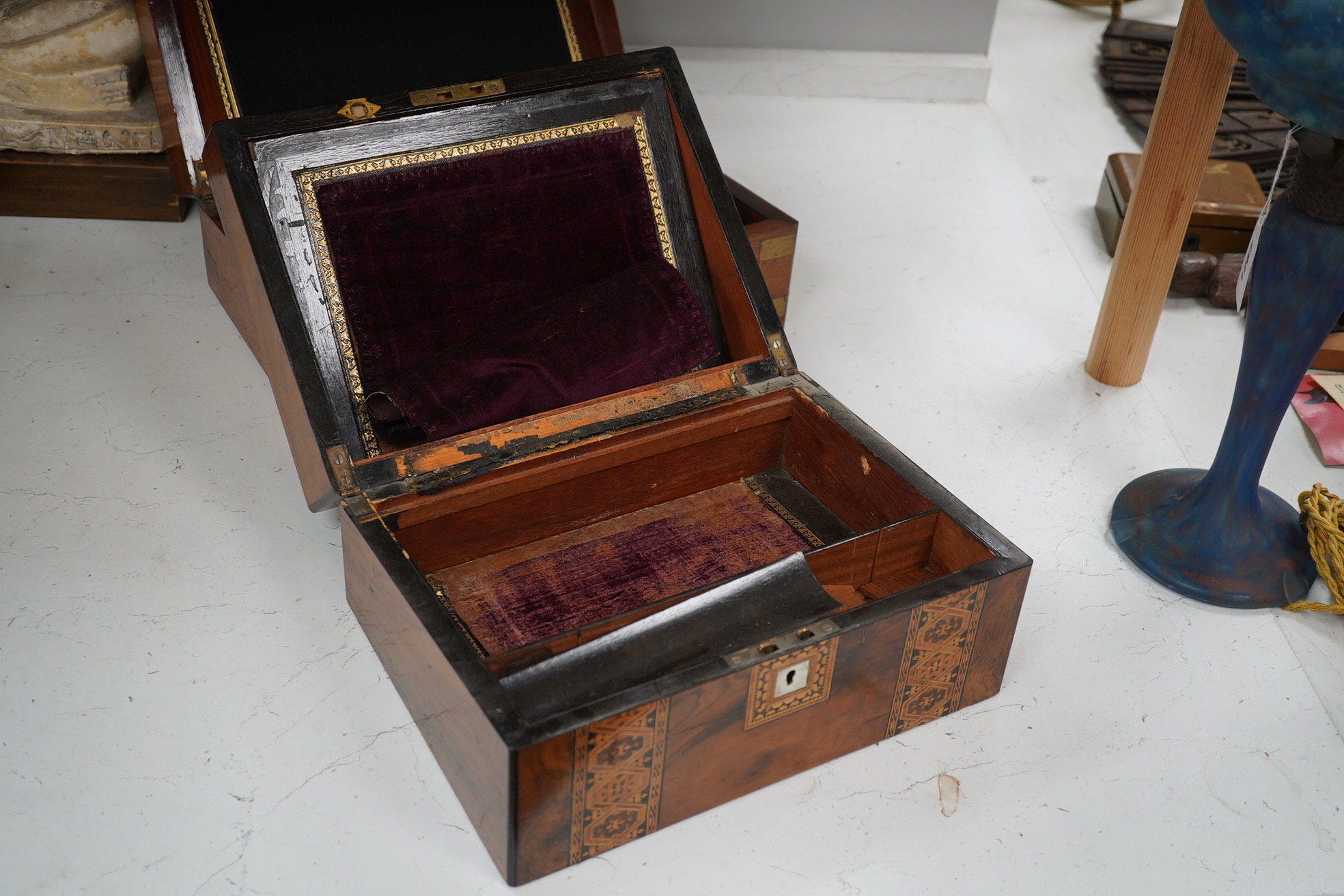 A mahogany brass mounted 19th century writing box and a walnut inlaid and mother of pearl writing box, brass mounted box, 35cm wide. Condition - exterior good, felt on slope torn.